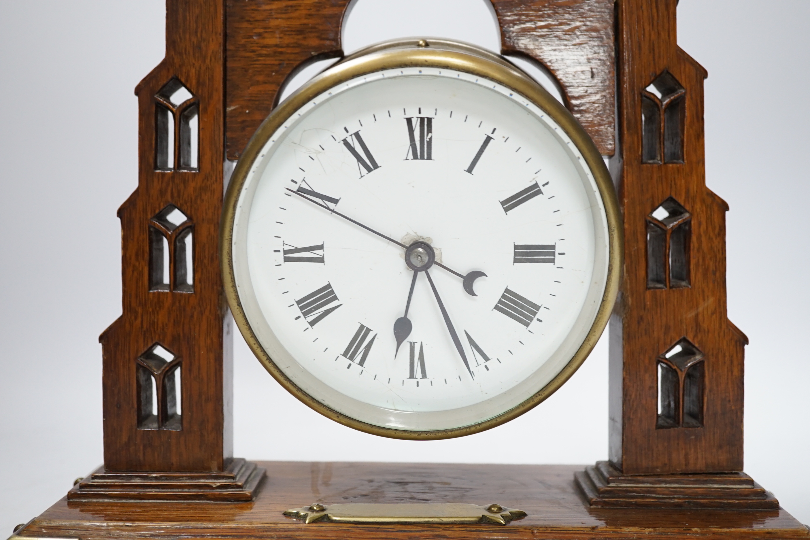 A G.P.O. timepiece and oak stand, 30cm wide